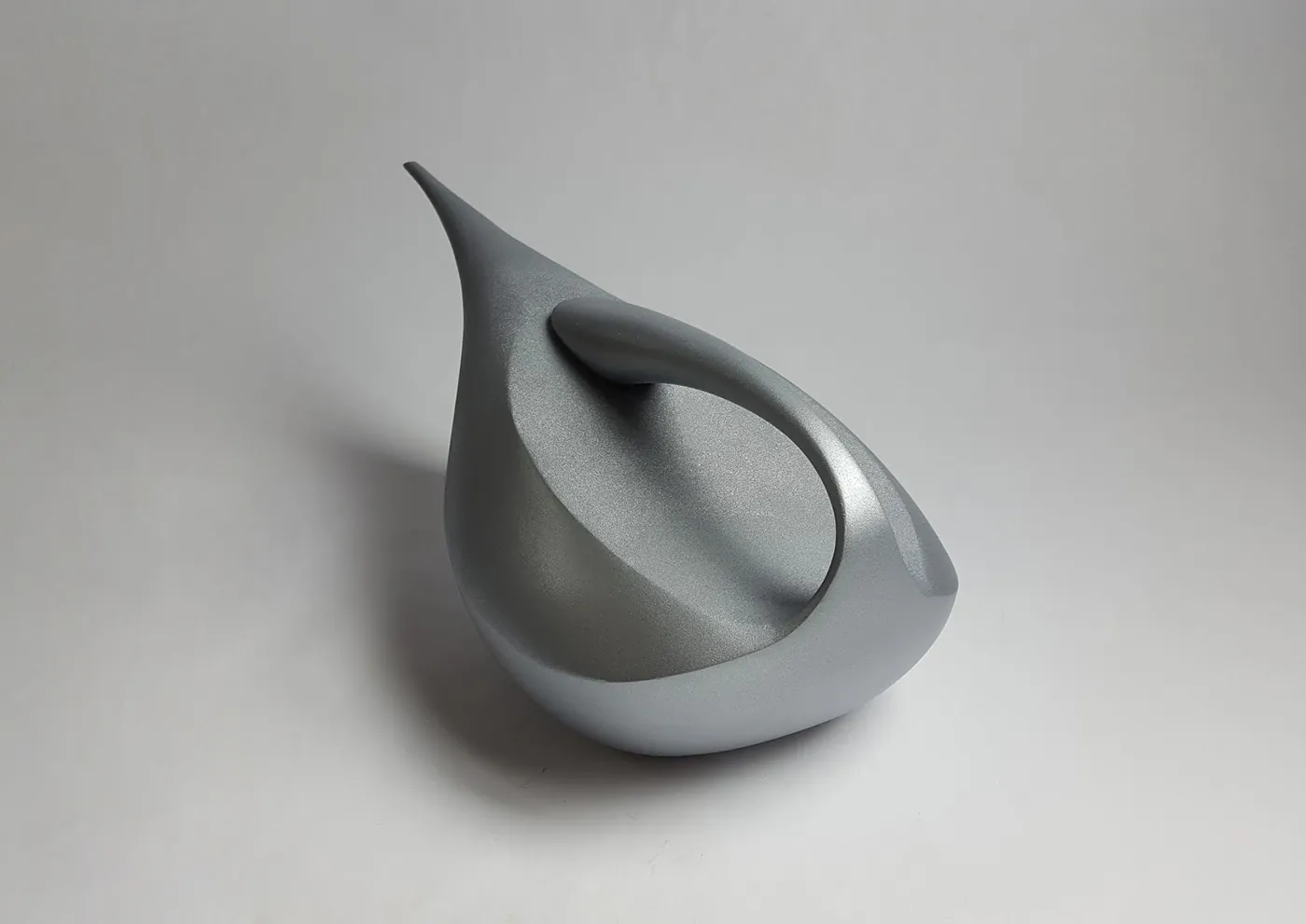 Silver sculptural form study, three-quarter view