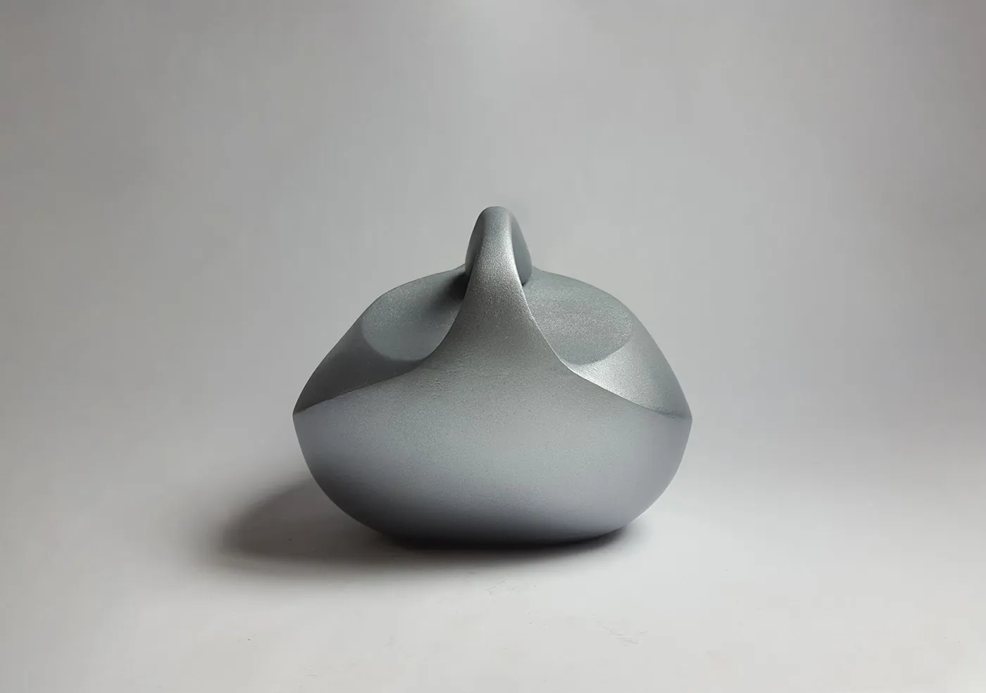 Silver sculptural form study, side view