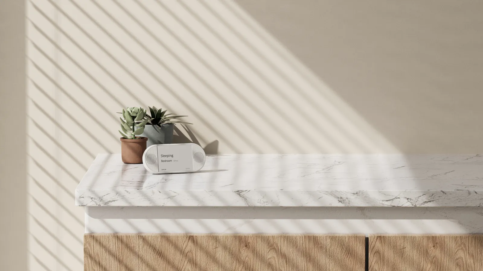 The caregiver display on a marble kitchen counter beside two potted plants, in striped afternoon light, reading Sleeping, Bedroom