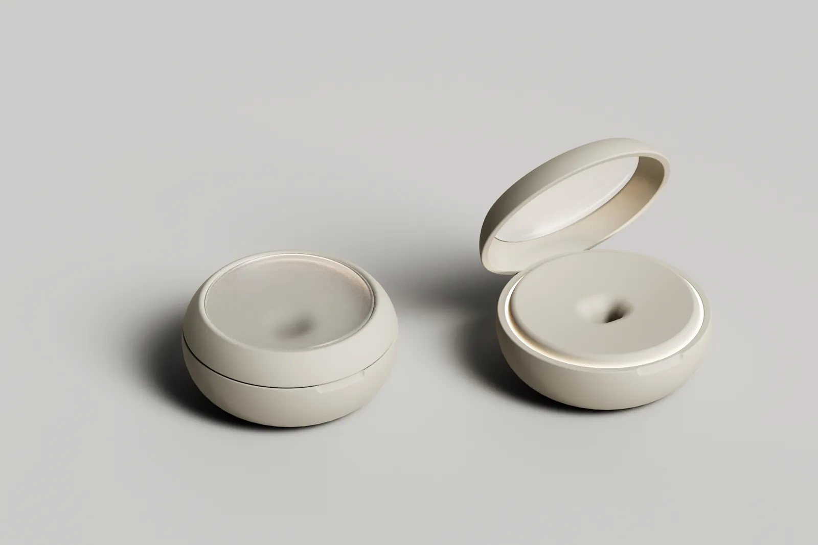 Render of a round base station with a concave frosted top and a hinged lid