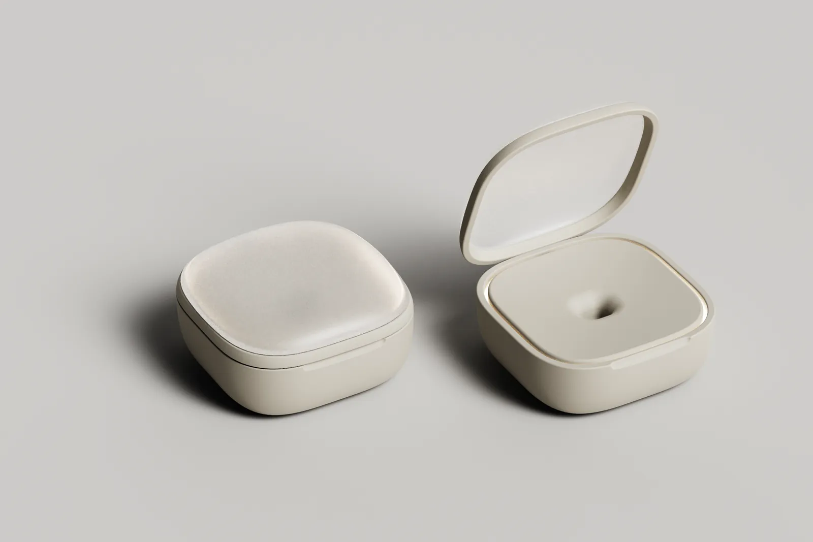 Render of a soft rounded-square base station with a frosted lid
