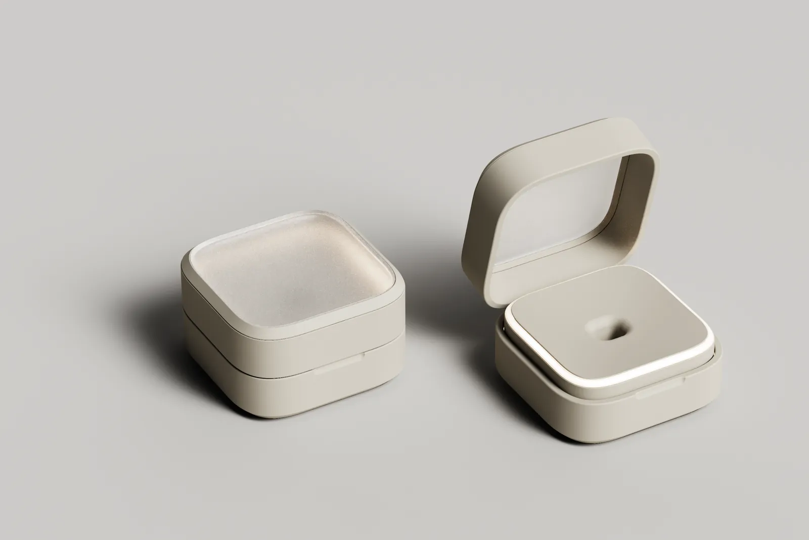 Render of a squared-off base station with a metal rim and a frosted lid