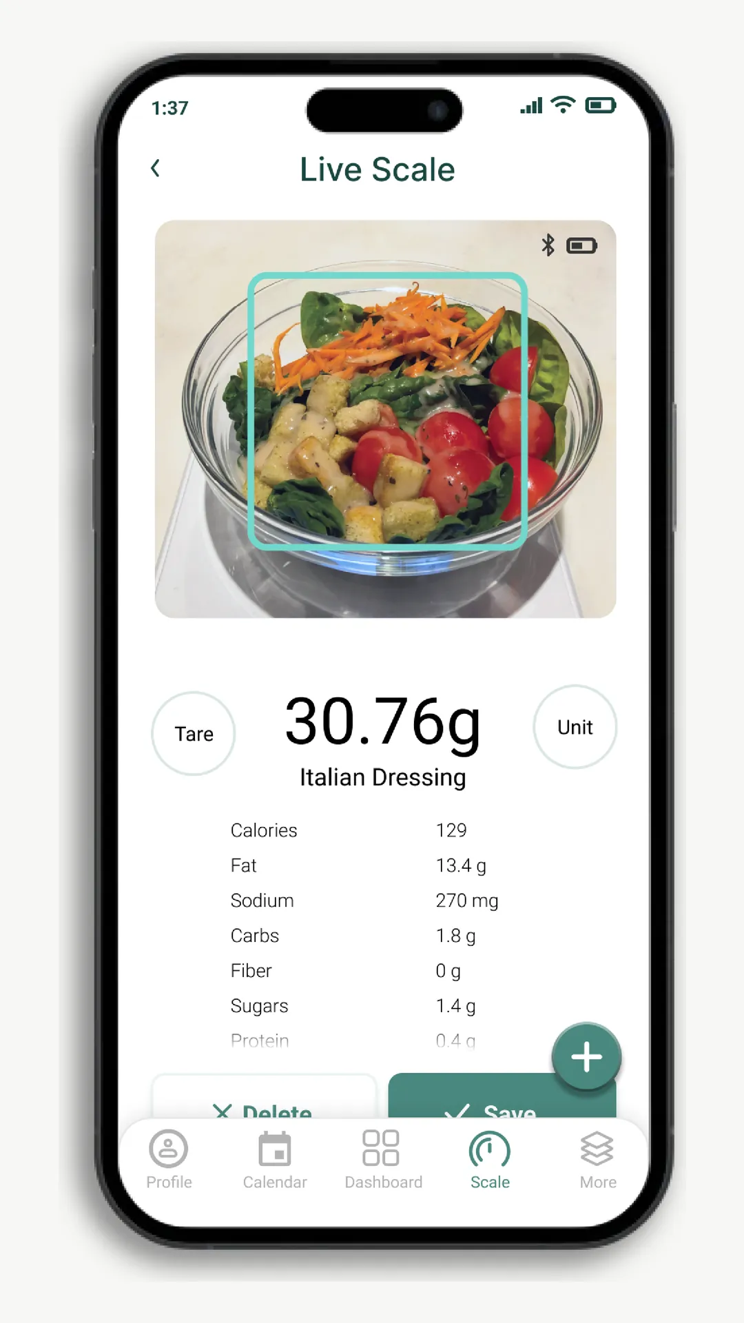 Live Scale screen: a camera view of a salad bowl on the scale with a recognition box, 30.76 g Italian dressing, tare and unit buttons, and its nutrients