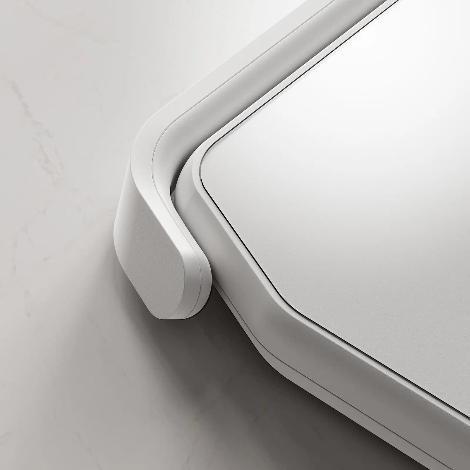 Close-up of one corner of the scale where the folded camera arm meets the edge of the glass top