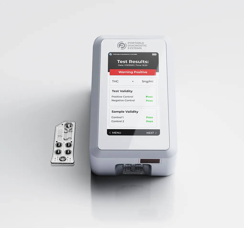 Front view render of the white Integrity-1 with a cartridge lying beside it, the screen showing a test result