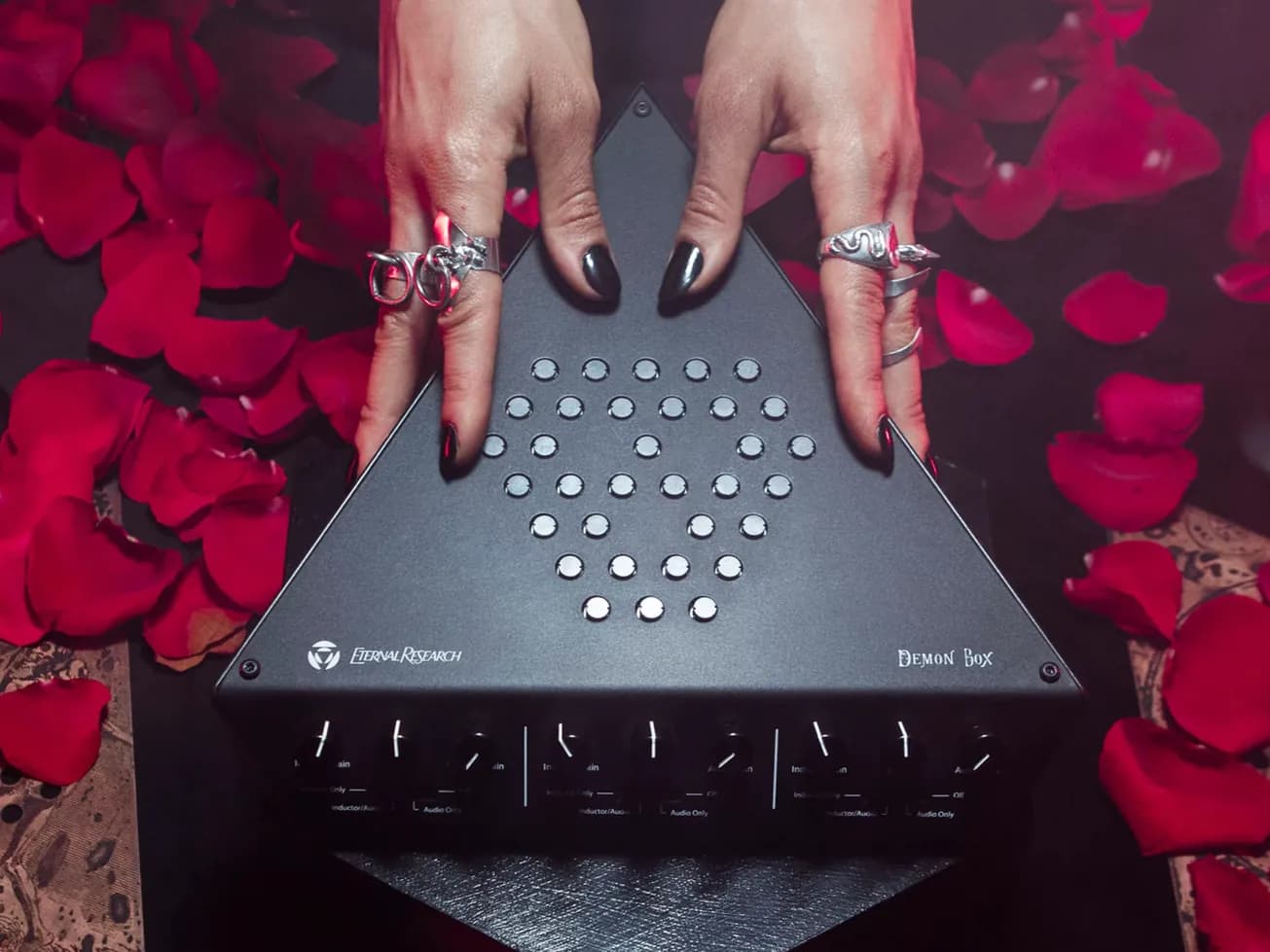 Demon Box held over rose petals