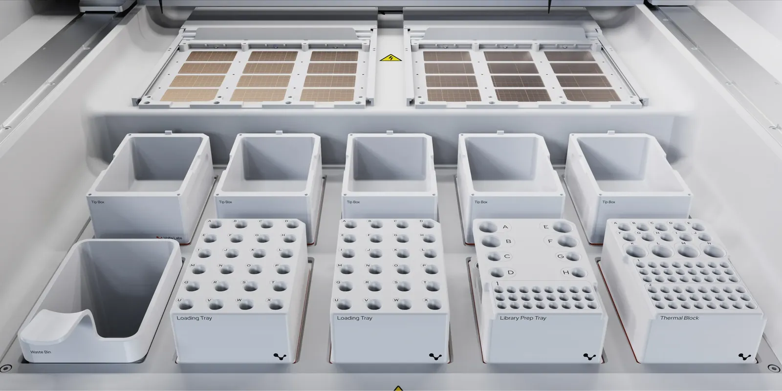 The loaded bed: tip boxes, loading trays, library prep tray and plasma block, with the cartridge above