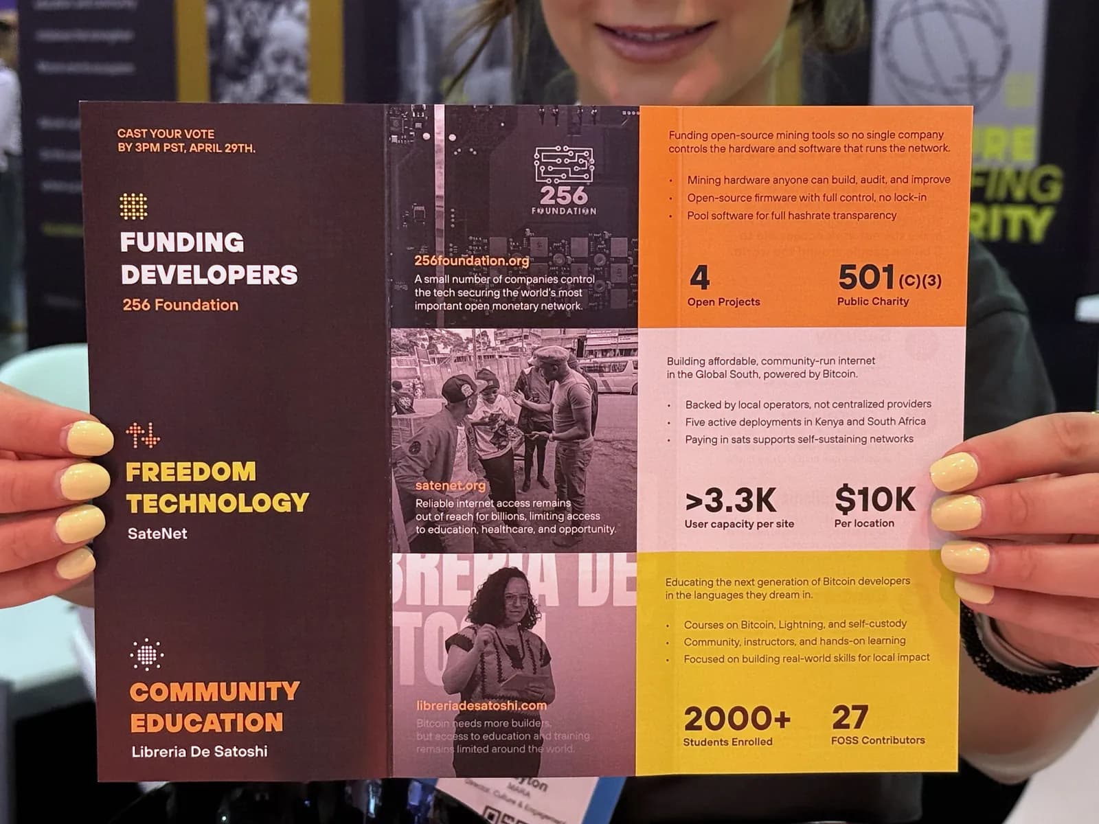 The brochure inside: funding developers, freedom technology, and community education with photos and figures