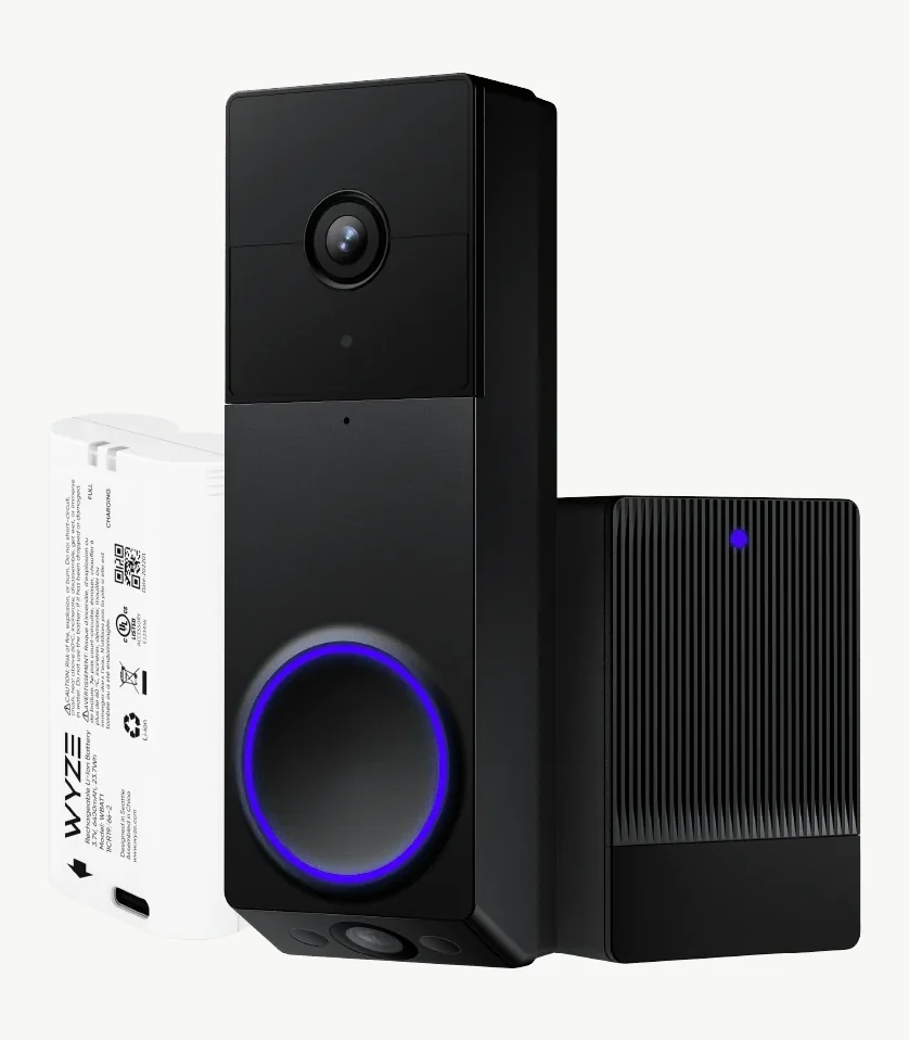 The shipped black Duo Cam Doorbell with its battery and the black ribbed chime